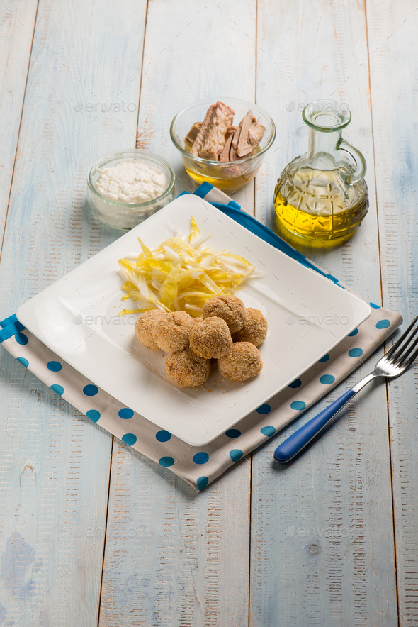 tuna meat balls with ricotta cheese and salad Stock Photo by